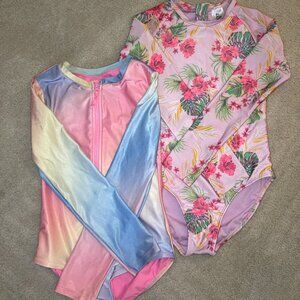 Set of two long-sleeve, one-piece swim suits